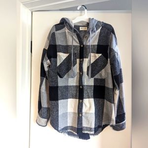 Black and gray flannel hoodie with frayed bottom hem